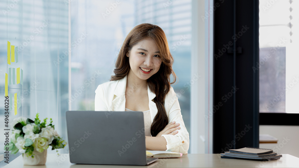 Beautiful Asian woman is a businesswoman who leads a new generation of startups, a woman who runs and manages a business plan to build confidence and stability in business, woman-led business concept. Beautiful Asian woman is a businesswoman who leads a new generation of startups, a woman who runs and manages a business plan to build confidence and stability in business, woman-led business concept.
