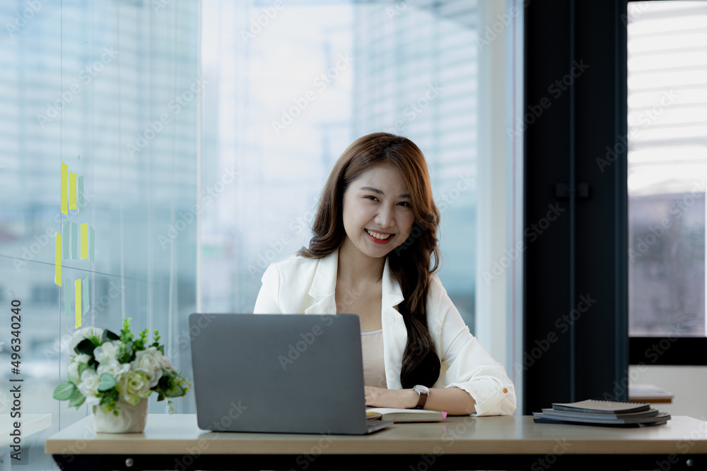 Beautiful Asian woman is a businesswoman who leads a new generation of startups, a woman who runs and manages a business plan to build confidence and stability in business, woman-led business concept. Beautiful Asian woman is a businesswoman who leads a new generation of startups, a woman who runs and manages a business plan to build confidence and stability in business, woman-led business concept.