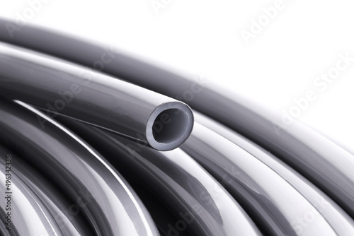 Flexible pipe on underfloor heating made of cross-linked polyethylene with an oxygen barrier. Materials for home insulation. Innovative technology. Installation for comfort and coziness.

