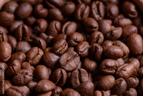 Coffee. Closeup coffee beans with out of focus background.