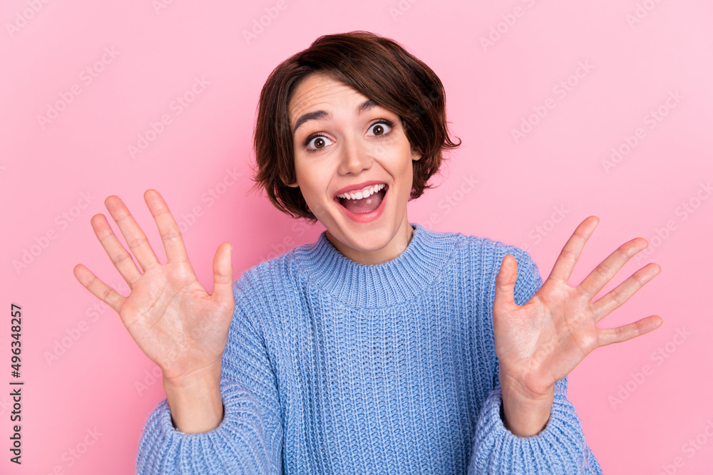 Portrait of funny positive lady hands palms demonstrate number ten open mouth isolated on pink color background Portrait of funny positive lady hands palms demonstrate number ten open mouth isolated on pink color background