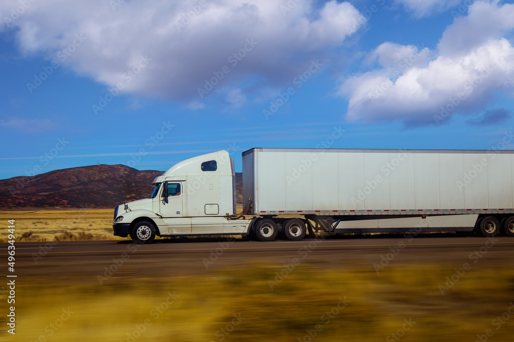 Semi Trucks on the Nevada Highway, USA. Trucking in Nevada , USA Semi Trucks on the Nevada Highway, USA. Trucking in Nevada , USA