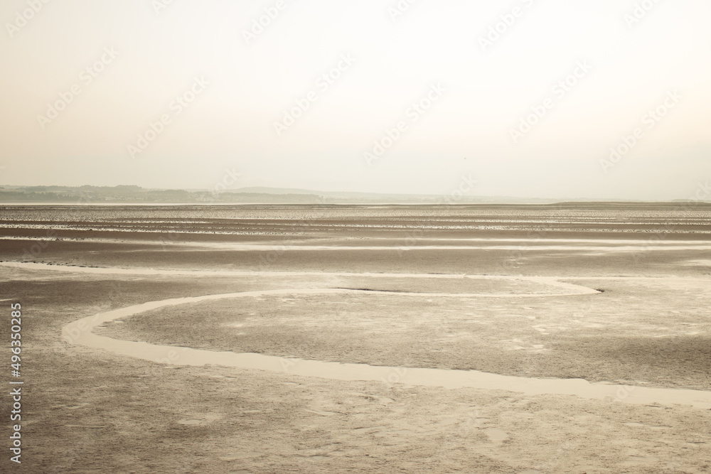 Naklejka premium misty beach in the morning