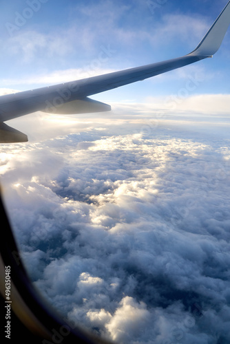 Obraz na płótnie Clouds and sky as seen through window of an airplane during flight w salonie