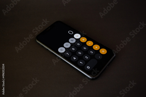 Calculator on the phone for calculation © Tetiana Romaniuk