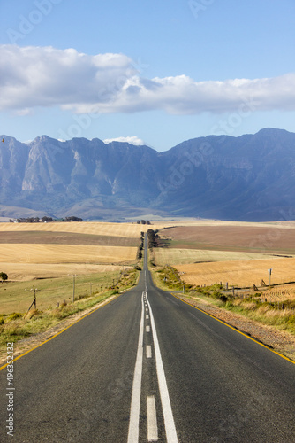 Beautiful lonely road in South africa - mountains in background