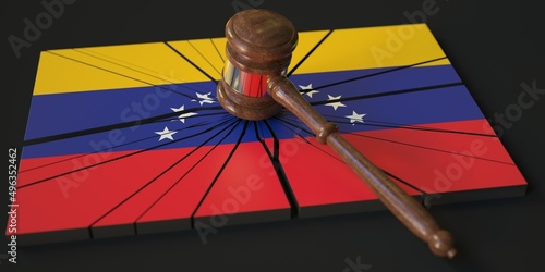 Fototapeta Block with flag of Venezuela hit by judge's gavel