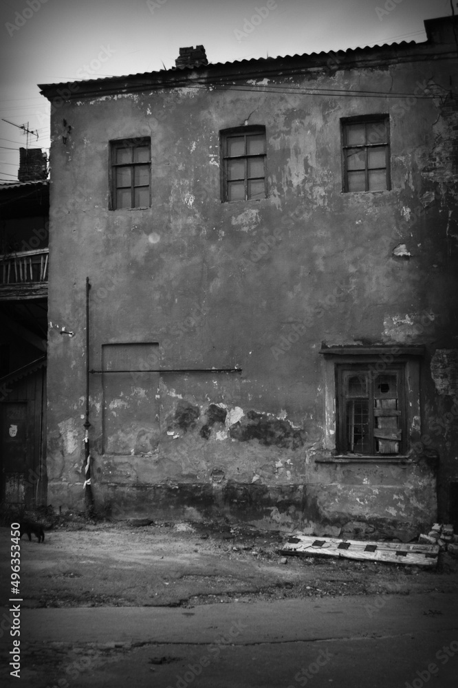 Damaged, destroyed building as a result of the war between Russia and Ukraine. Black and white photography Damaged, destroyed building as a result of the war between Russia and Ukraine. Black and white photography