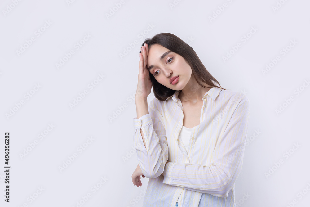 Portrait of a beautiful young woman thinking, isolated on white background Portrait of a beautiful young woman thinking, isolated on white background