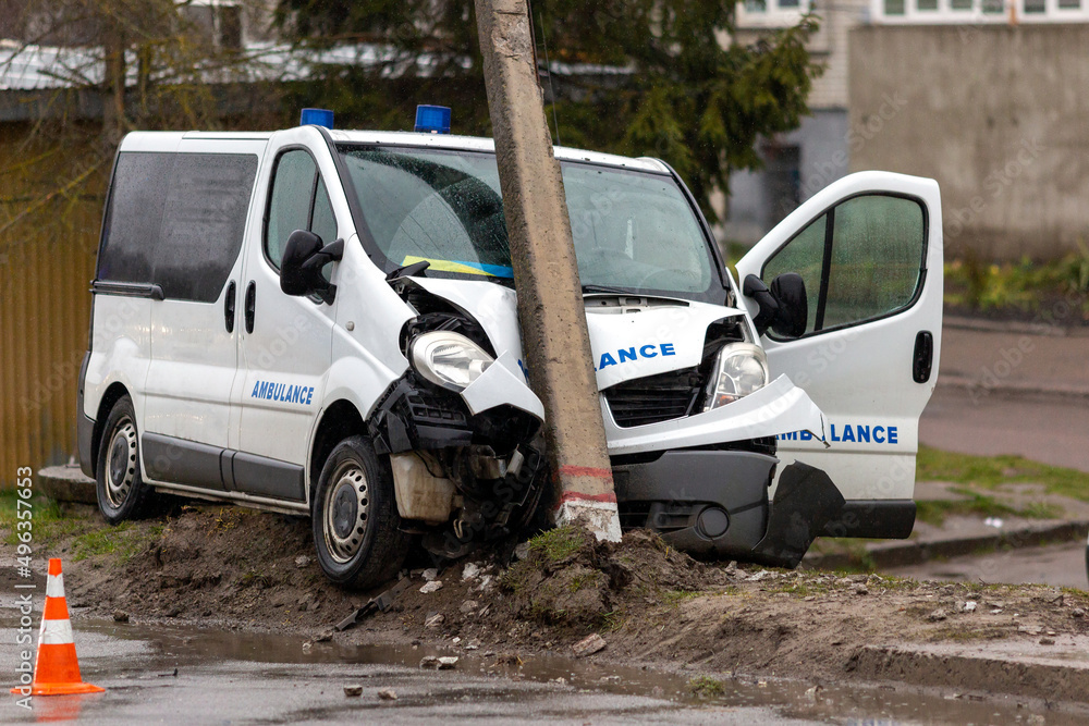 The ambulance crashed into a concrete pillar. Car accident. Car insurance.