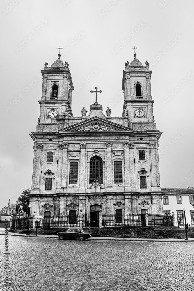 Porto, Portugal: Retro car in front of the church of Our Lady of Lapa in black and white