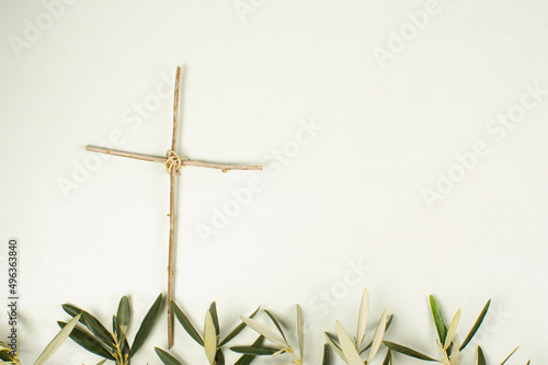 Cruz con rama de olivo, domingo de ramos, semana santa. photo