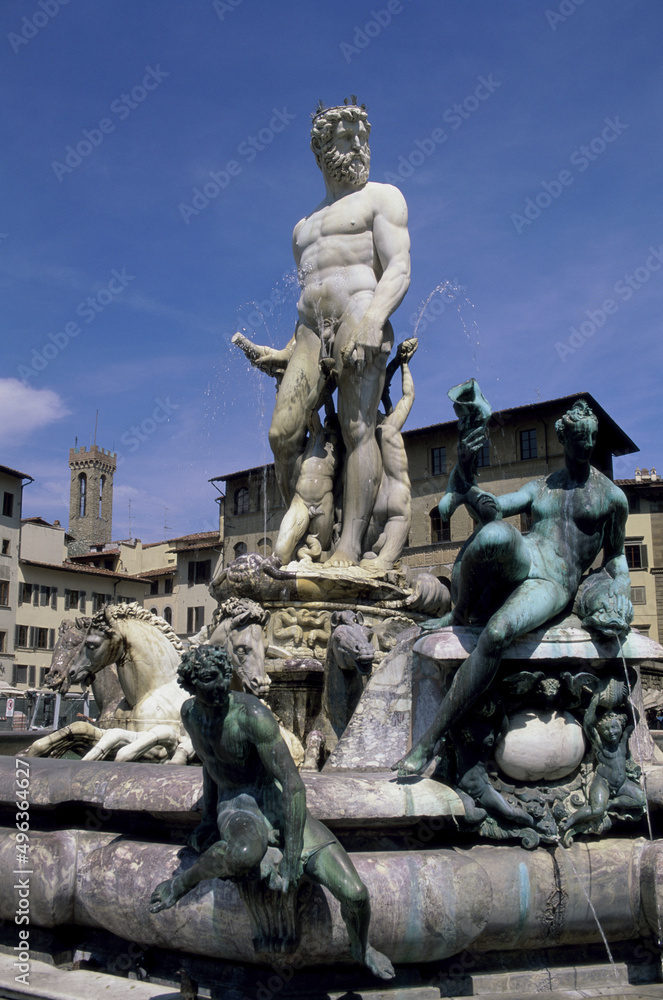 Low angle view of statues on a fountain, Fountain of Neptune, Piazza della Signoria, Florence, Italy Low angle view of statues on a fountain, Fountain of Neptune, Piazza della Signoria, Florence, Italy