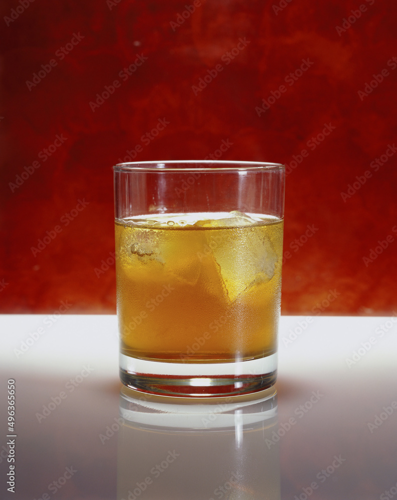 Glass of whisky with ice Glass of whisky with ice