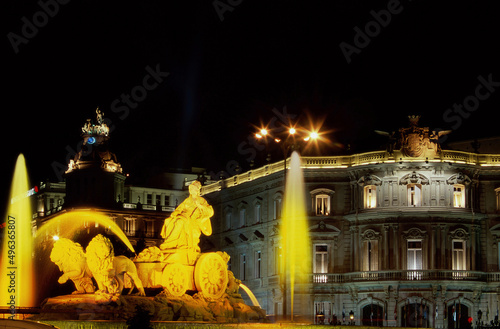 Fountain lit up at night, Cibeles Fountain, Plaza de Cibeles, Madrid, Spain photo