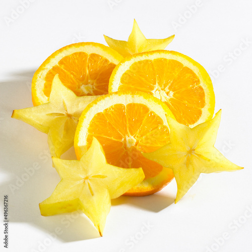 Close-up of starfruit and orange slices photo