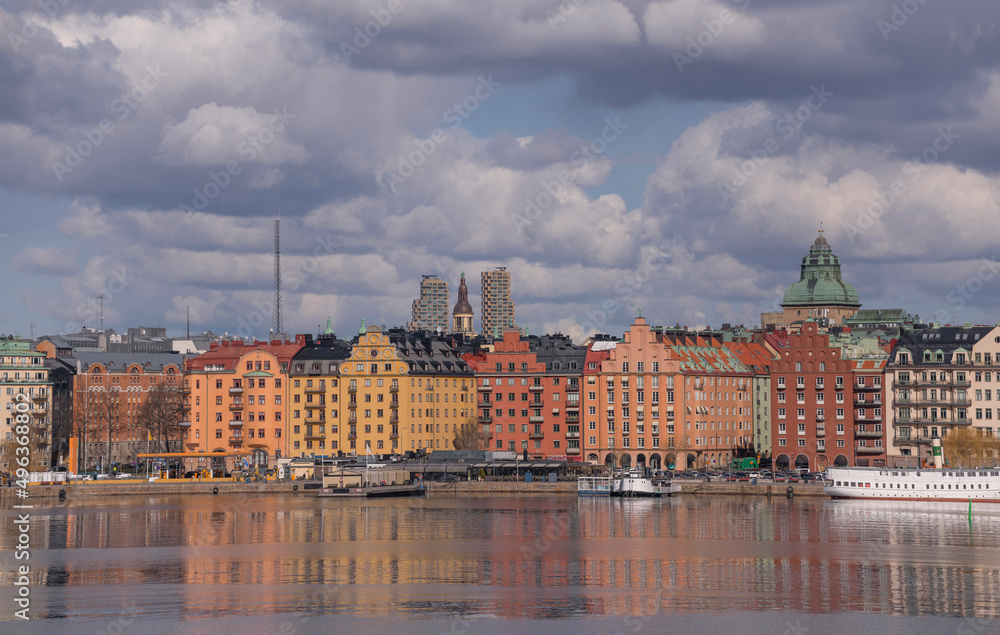Bay view over the island Kungsholmen with apartment buildings and towers a sunny spring day in Stockholm