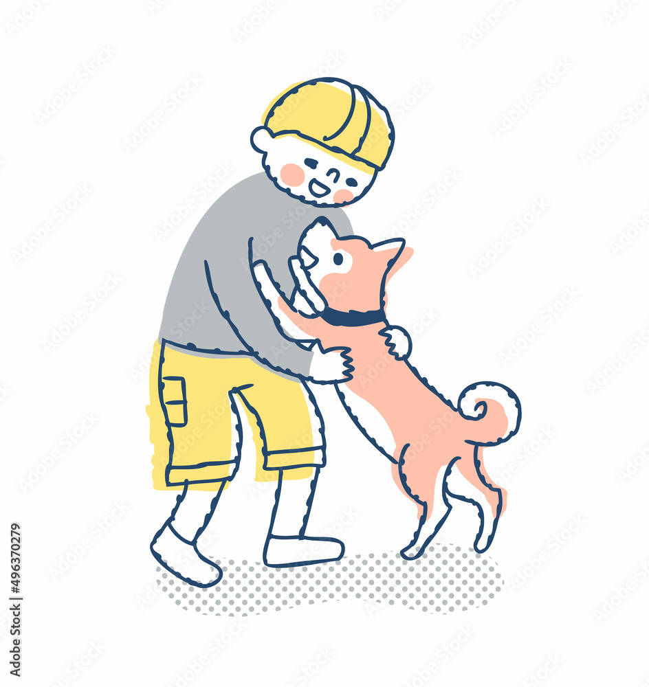 犬と戯れ合う男の子