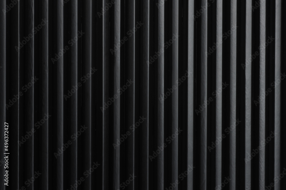 Minimalist art picture: black pencils next to each other form vertical dark lines. Artistic, elegant design structure for graphics, backgrounds. Minimalist art picture: black pencils next to each other form vertical dark lines. Artistic, elegant design structure for graphics, backgrounds.