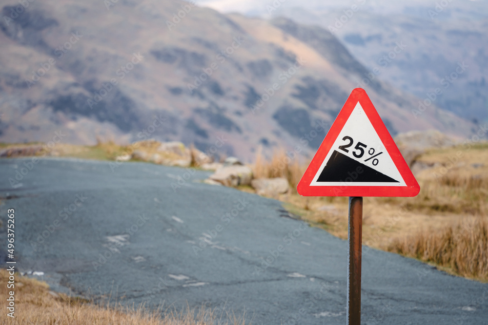 25% gradient sign on a steep mountain road in the Lake District National Park