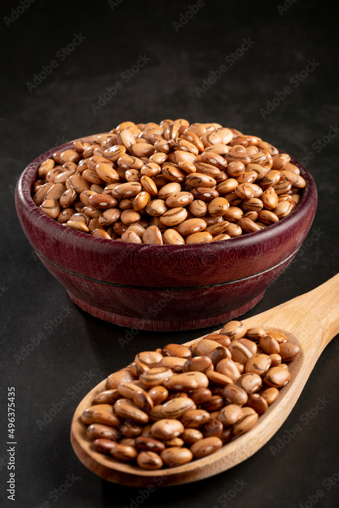 Raw pinto beans on the table. Raw pinto beans on the table.