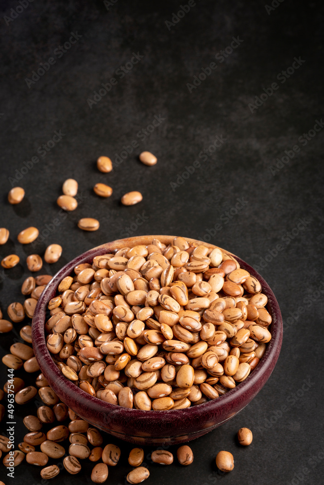 Raw pinto beans on the table. Raw pinto beans on the table.