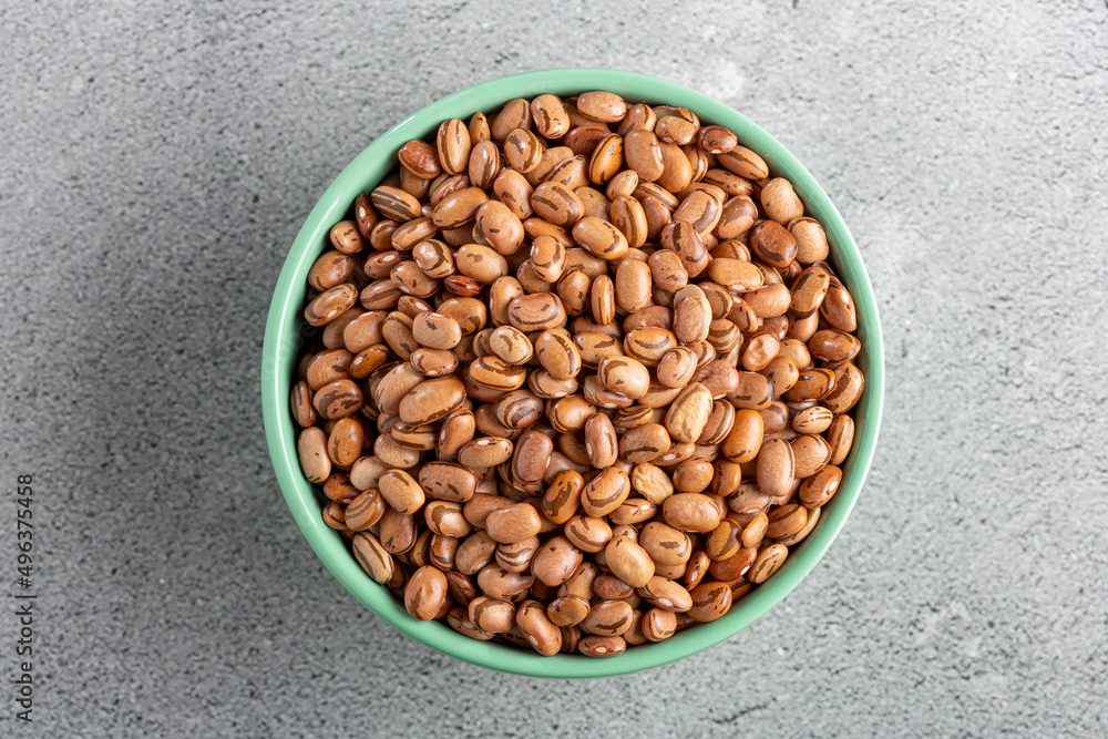 Raw pinto beans on the table. Raw pinto beans on the table.