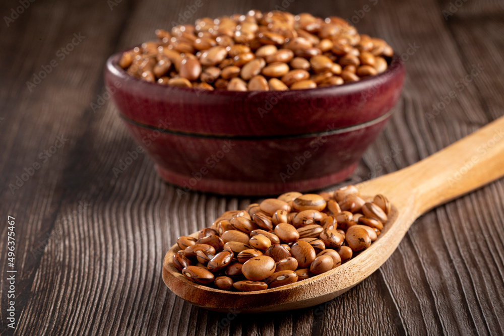 Raw pinto beans on the table. Raw pinto beans on the table.