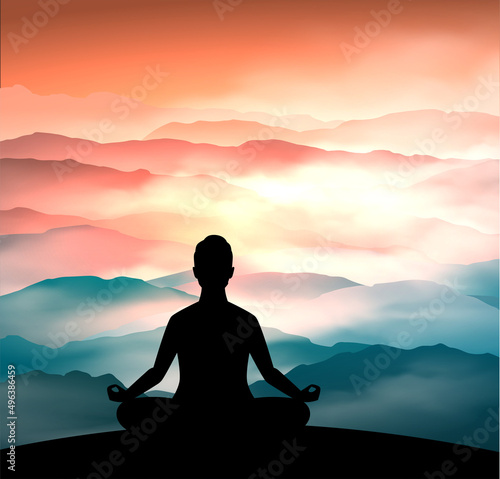 Man meditating in sitting yoga position on the top of a mountains