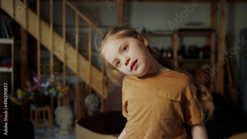 Wallpaper Mural The child makes funny faces and wrinkles while singing a song Torontodigital.ca