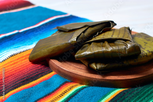 Mexican Tamales Oaxaquenos in banana leaves traditional from Oaxaca Mexico photo