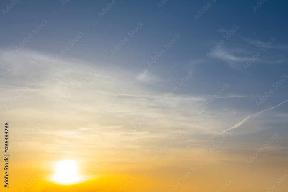 dramatic sunset on blue cloudy sky, natural evening sky background