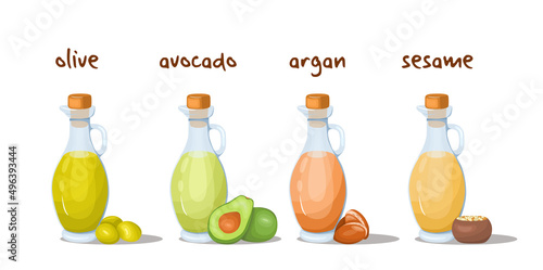 Set of organic oils in glass jugs. Healthy food concept. Ketogenic and paleto diet. Vegetarian and vegan food.