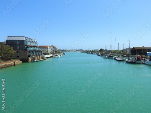 River in a town with blue skies