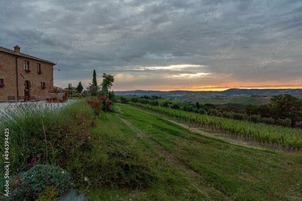 adorable sunrise in Tuscany, Italy, cloudy morning, spring time, clouds in the sky