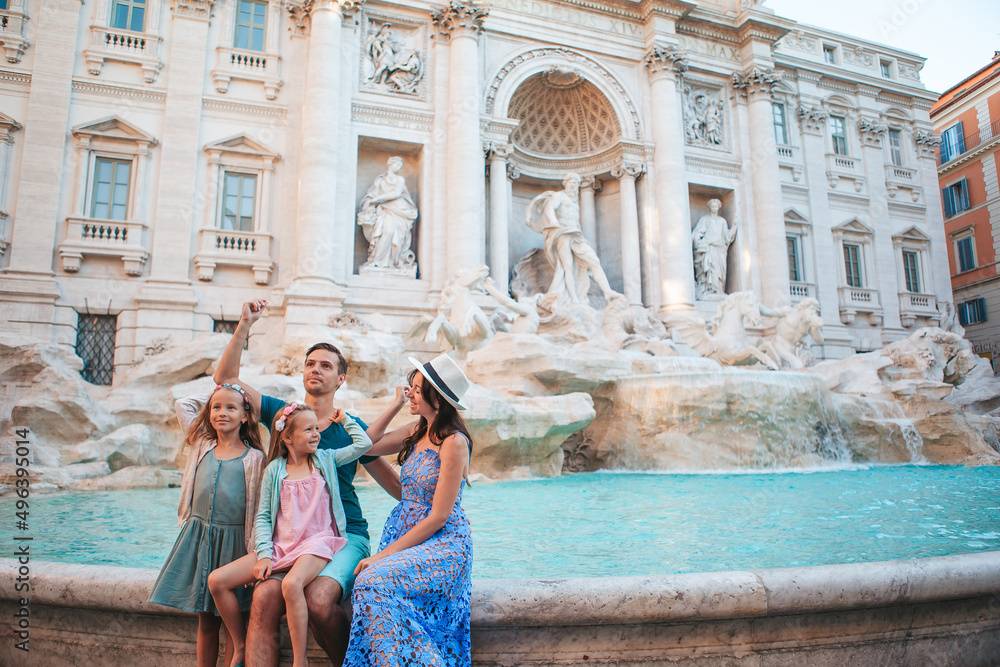Family near Fontana di Trevi, Rome, Italy.