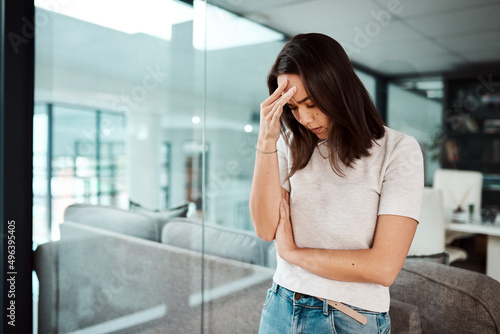 Workplace stress is a major risk factor for anxiety and depression. Shot of a young businesswoman looking stressed out in an office. Free Download Workplace stress is a major risk factor for anxiety and depression. Shot of a young businesswoman looking stressed out in an office. - GFXLoad