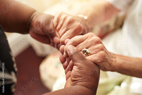 Kindness. Pay it forward. Cropped shot of a senior woman holding her friends hands in comfort.