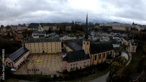 Grund district is one of Luxembourg City's oldest neighborhoods. Grund is the lower fortified area of the city, located on the banks of River Alzette. Neimenster Cultural Center and St John's Church. photo