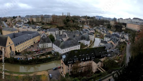 PAN SHOT - The Grund district is one of Luxembourg City's oldest neighborhoods, located on the banks of River Alzette. Neimenster Cultural Center and St John's Church. photo