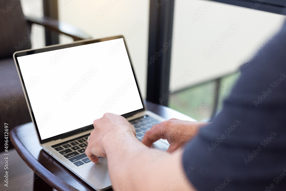 computer screen blank mockup.hand woman work using laptop with white background for advertising,contact business search information on desk at coffee shop.marketing and creative design computer screen blank mockup.hand woman work using laptop with white background for advertising,contact business search information on desk at coffee shop.marketing and creative design