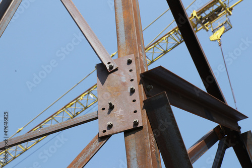Assembly of steel tower with bolt and nut on site
