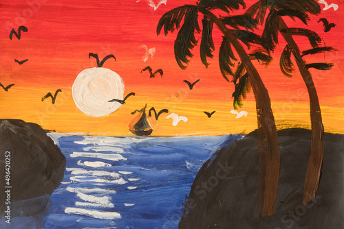 seascape with palm trees at sunset