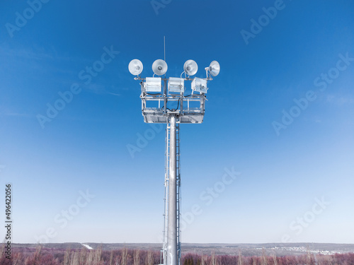 Aerial view of a mast with spotlights.