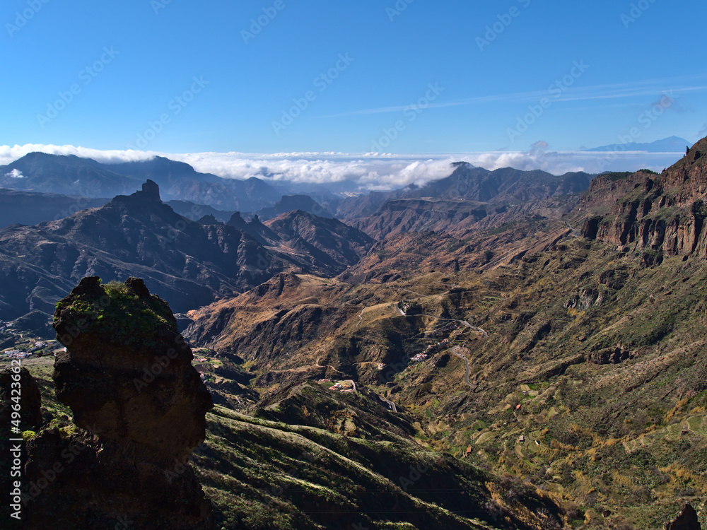 Stunning view of the colorful central mountains of island Gran Canaria, Canary Islands, Spain in sunny day in winter viewed on hiking tour near Tejeda.