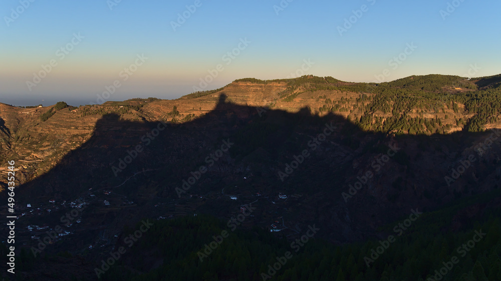 Beautiful landscape of the central mountains of island Gran Canaria, Canary Islands, Spain in the evening sunlight with the shadow of rocks.