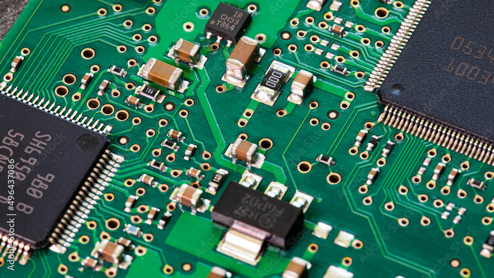 Macro Close up of components and microchips on PC circuit board Macro Close up of components and microchips on PC circuit board