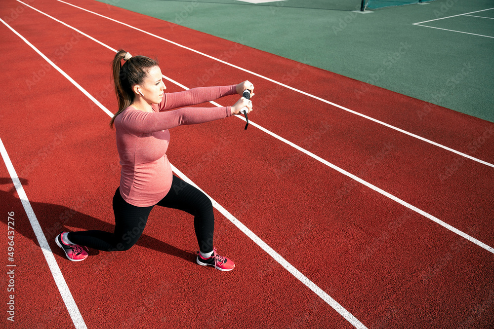 Pregnancy fitness. Prenatal healthy fitness active fit gym outside. Pregnant woman training yoga sport exercise. Prenatal Gymnastics.