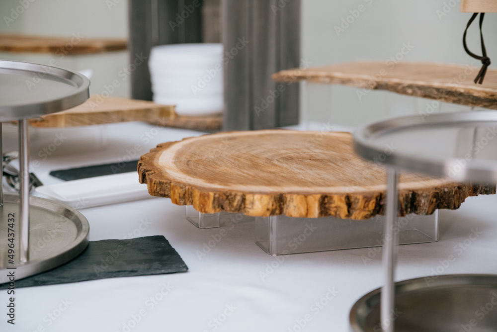 Wooden stand for dishes on the table