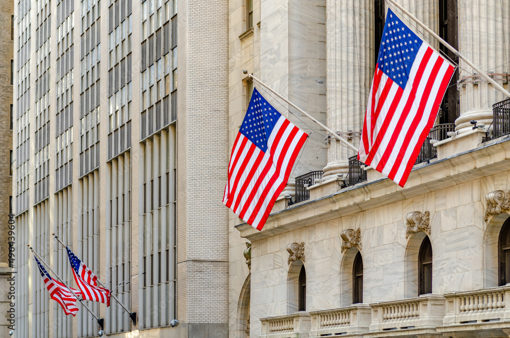 American Flags hanging down at New York Stock Exchange, Building with columns, close-up, horizontal